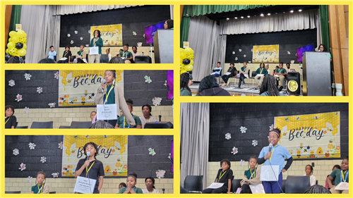 Students holding microphone while participating in school spelling bee